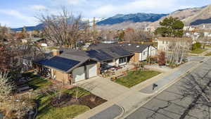 Aerial view of residential area with a mountain backdrop