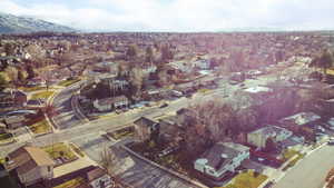 Aerial view of property's location featuring nearby suburban area
