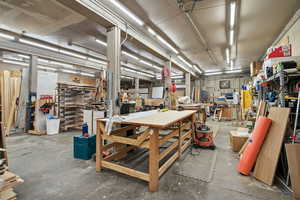 Miscellaneous room with a workshop area