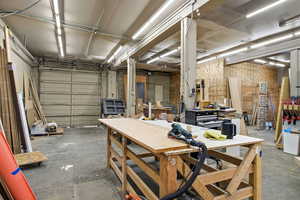 Garage featuring a workshop area