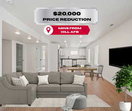 Living area with recessed lighting and light wood finished floors