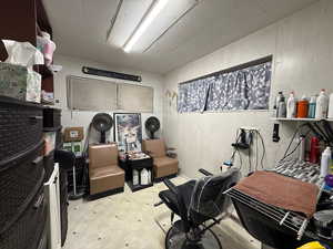 Miscellaneous room with light floors