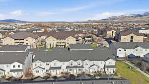 Aerial view of residential area featuring mountains