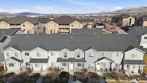 Aerial view of residential area with mountains