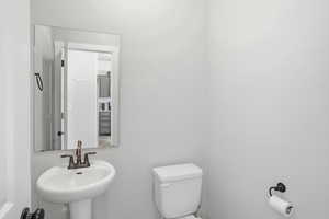 Half bathroom featuring toilet