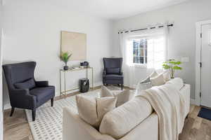 Living area featuring wood finished floors