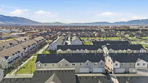 Aerial view of residential area with a mountainous background
