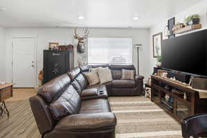 Living room featuring light wood-style floors