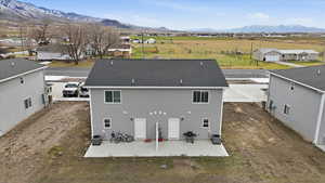 Aerial view of residential area with a mountain backdrop