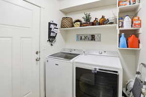 Laundry room with washer and dryer