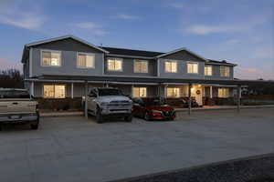 Traditional-style home with stone siding
