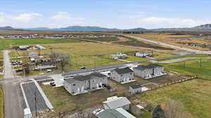 Aerial view of sparsely populated area with mountains