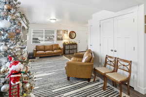 Sitting room featuring wood finished floors