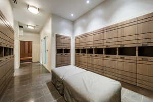 Bedroom with mail area and recessed lighting