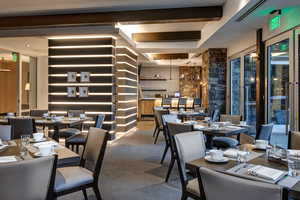 Dining room with carpet flooring