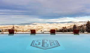View of yard featuring a mountain view and a patio area