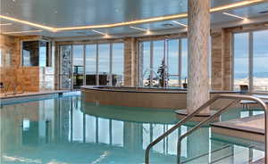 Indoor pool with a sunroom