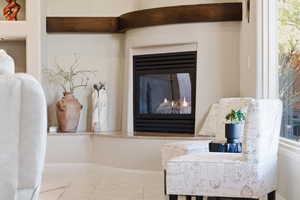 Detailed view of a glass covered fireplace