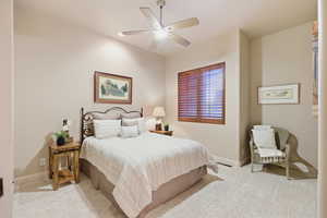 Bedroom with carpet and a ceiling fan