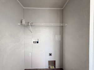 Laundry area featuring hookup for a washing machine and electric dryer hookup