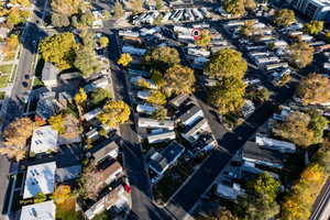 Aerial overview of property's location with nearby suburban area