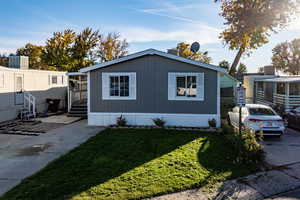 View of front facade with a front lawn