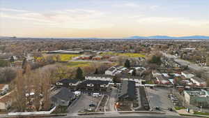 Aerial view of property's location featuring nearby suburban area