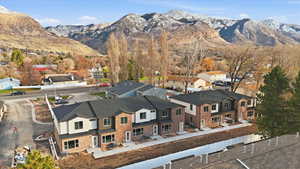 View of mountain backdrop with nearby suburban area
