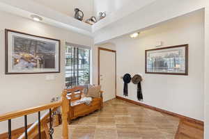 Sitting room featuring baseboards and light tile patterned floors