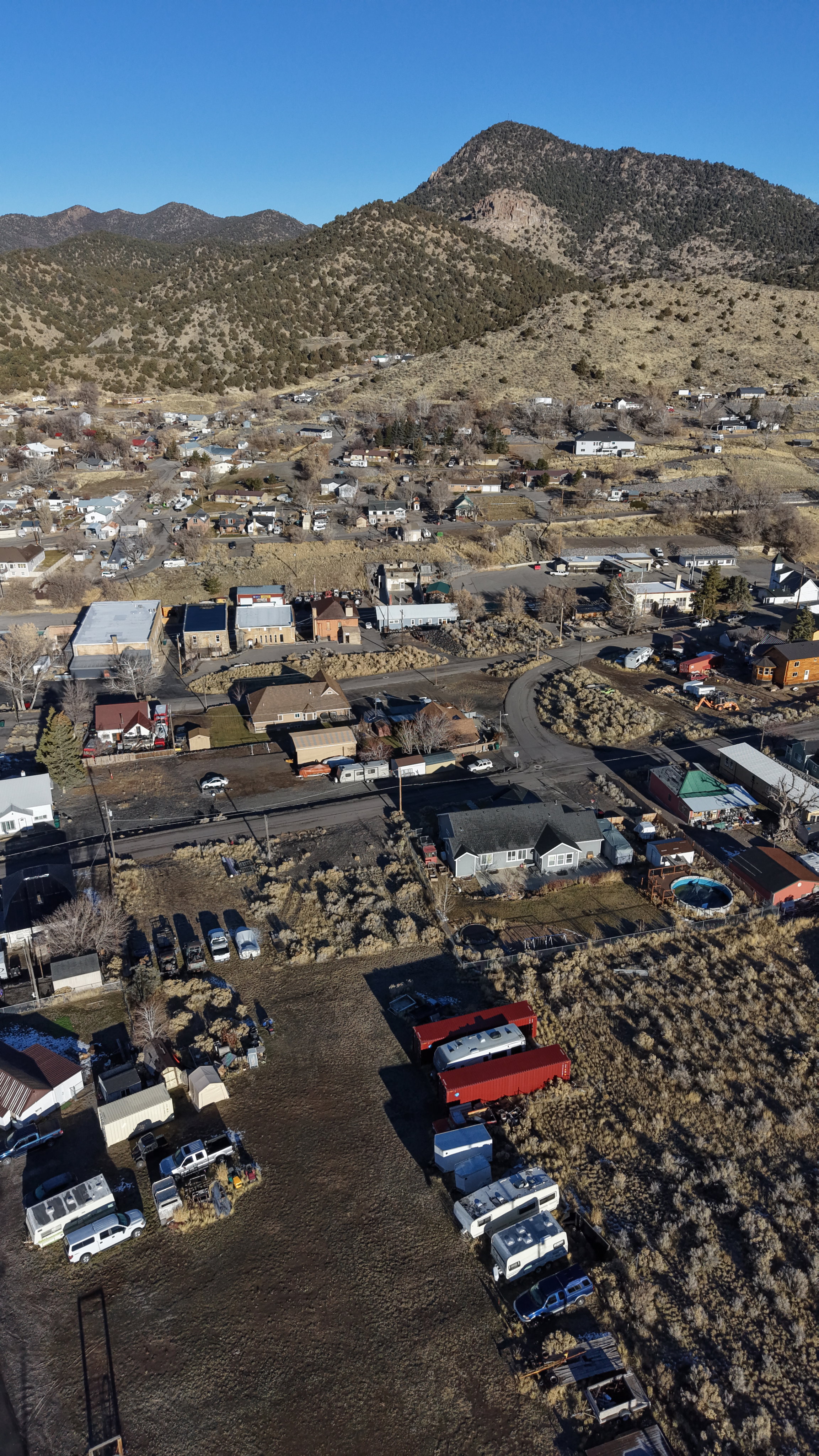 Aerial overview of property's location featuring mountains