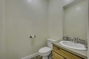 Bathroom with vanity and toilet
