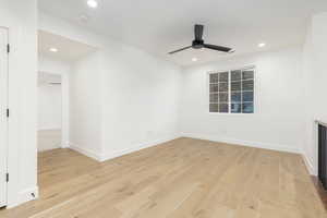 Unfurnished living room with light wood-style flooring, recessed lighting, and ceiling fan