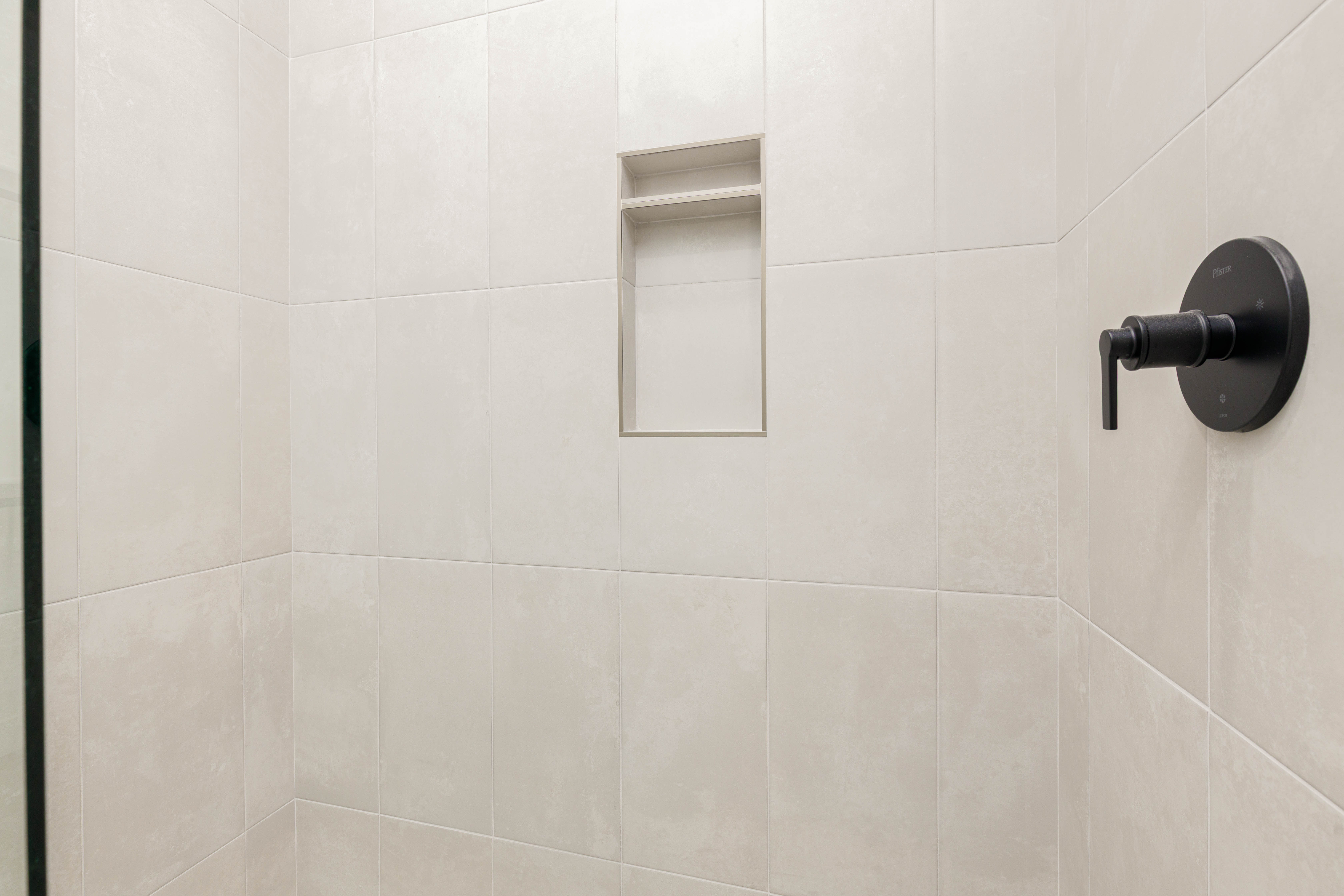 Bathroom view of tiled shower