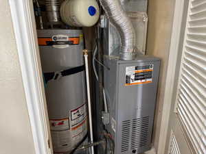 Utilities featuring strapped water heater and heating unit