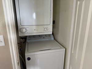 Washroom with stacked washer / dryer