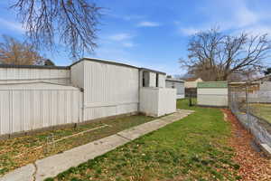 View of yard featuring an outdoor structure