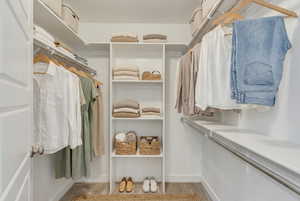 (VIRTUALLY STAGED)  of walk in closet