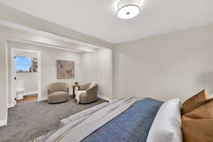 Bedroom with carpet and baseboards