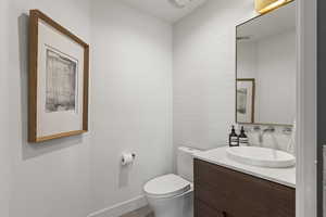 Bathroom with vanity and toilet