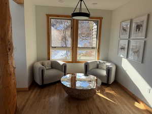 Sitting room with wood finished floors