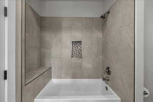 Bathroom with shower / tub combination
