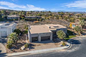 Aerial perspective of suburban area with a mountain backdrop