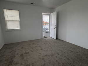 View of newly carpeted living room