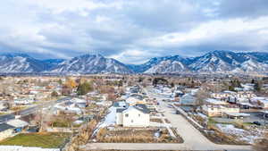 Aerial perspective of suburban area featuring mountains