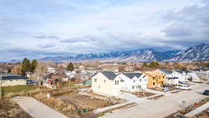 View of mountain backdrop with nearby suburban area