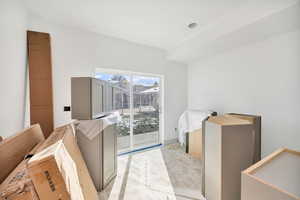 Unfurnished bedroom featuring access to outside