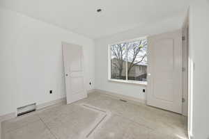 Spare room with baseboards
