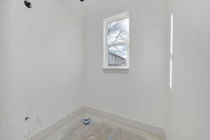 Full bathroom featuring a bath