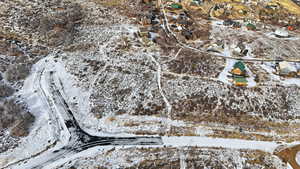 Snowy aerial view with a residential view