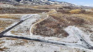 Snowy aerial view with a mountain view